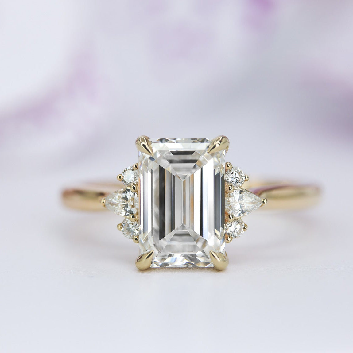 Engagement Ring Emerald With Pear and Round Side Stones