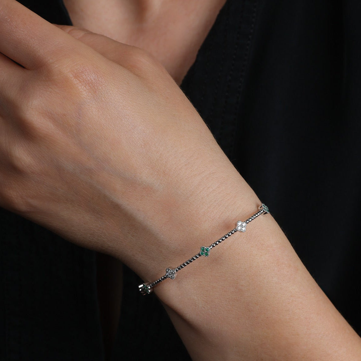 White Gold Stationed Clover Diamond and Emerald Flexible Bangle