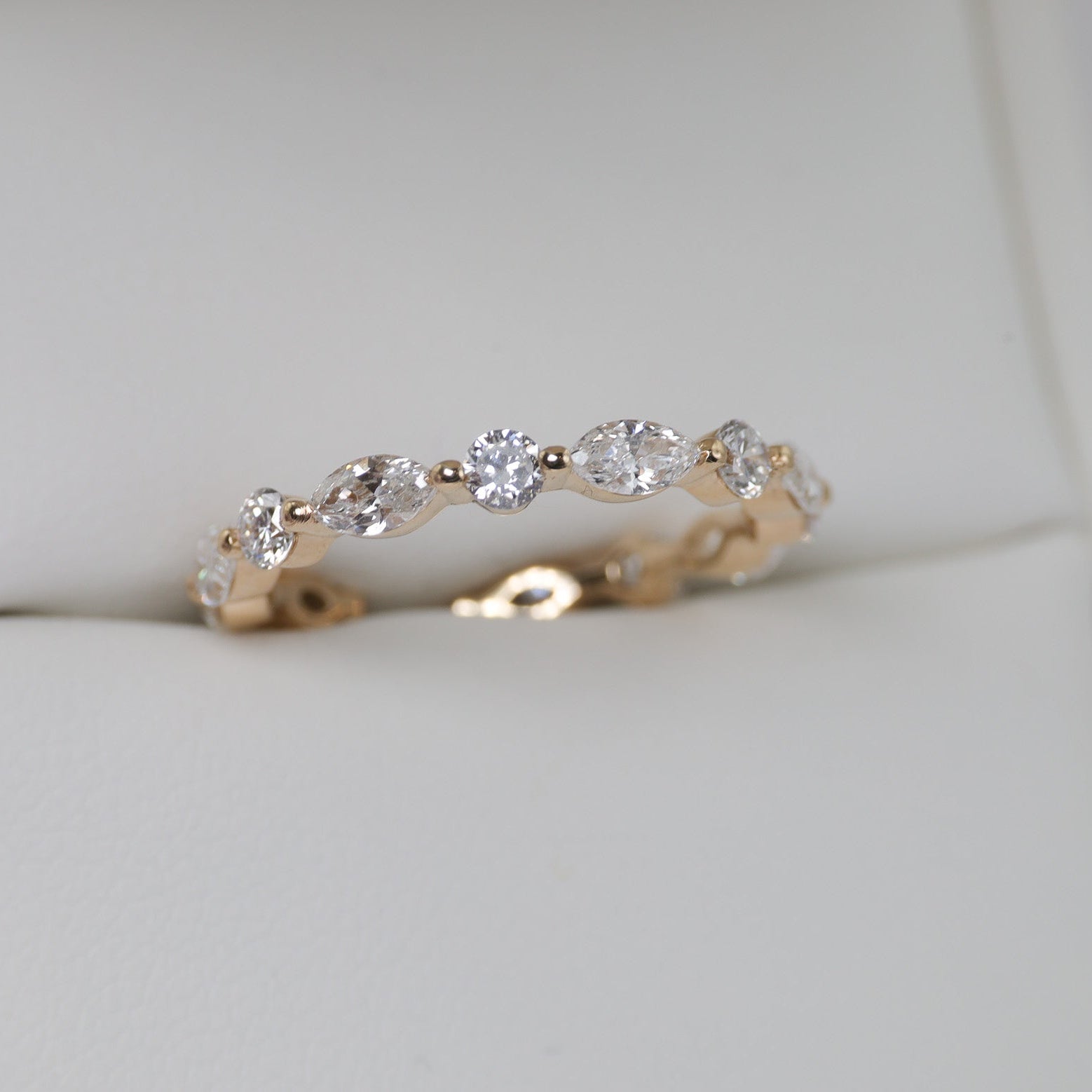 Marquise and Round Band Shared Prong